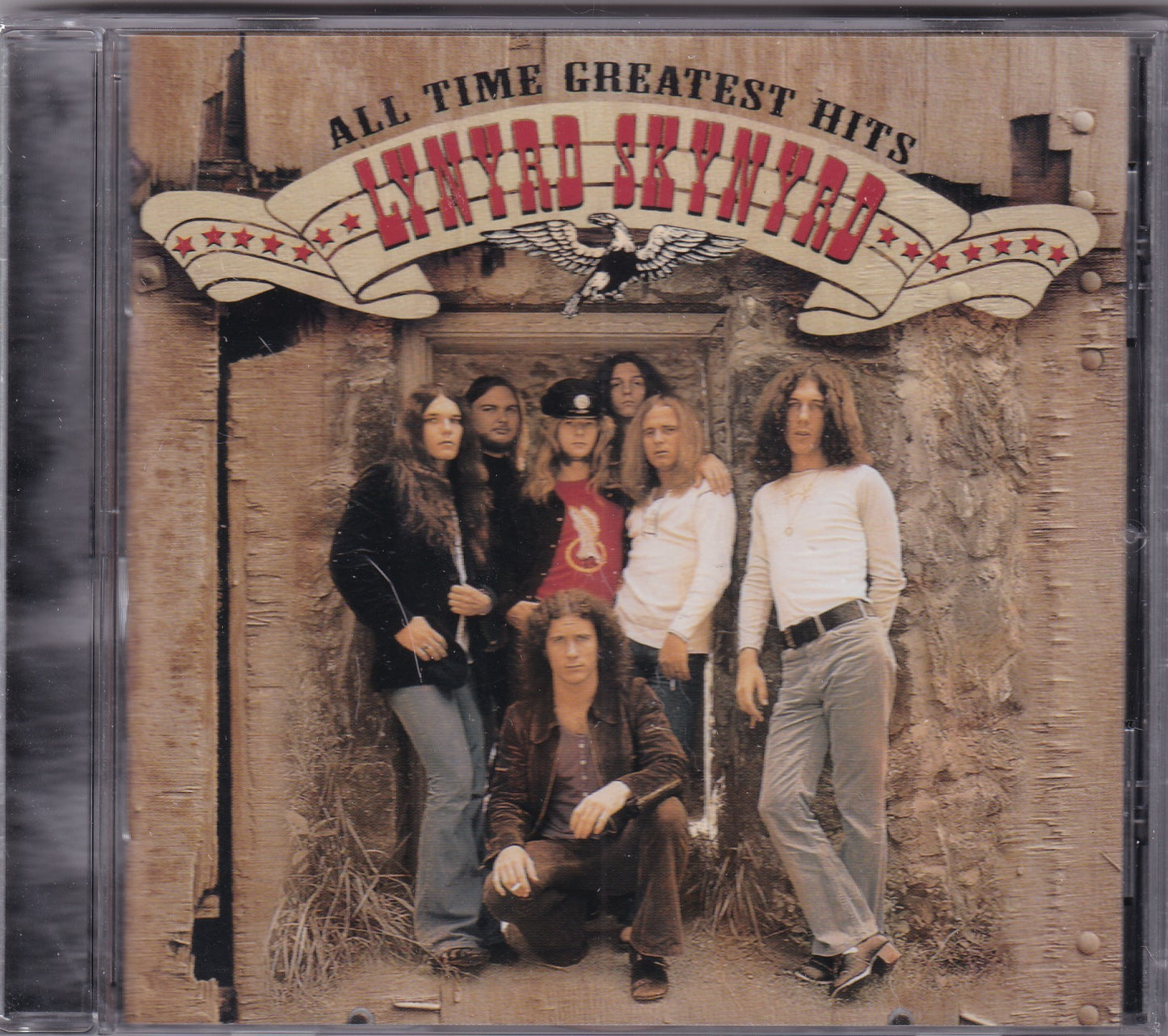 CD cover of Lynyrd Skynyrd's 'All Time Greatest Hits' with band members and vintage design.